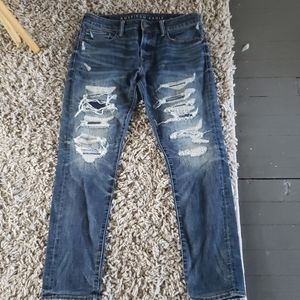Mens blue ripped jeans